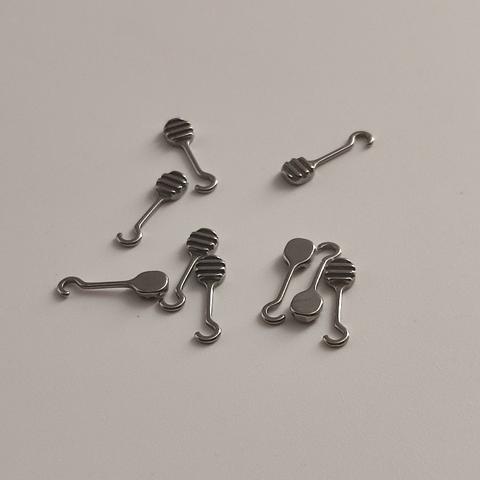 10Packs 100Pcs Bondable Sliding Crimpable Hook Long Curved Left Right 10Pcs/pack