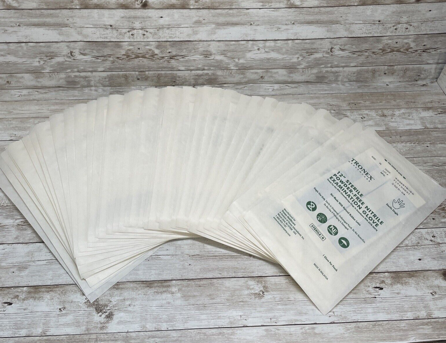 50 Single TRONEX 12″ STERILE NITRILE EXAM GLOVES, SIZE MEDIUM Manf: 04/20