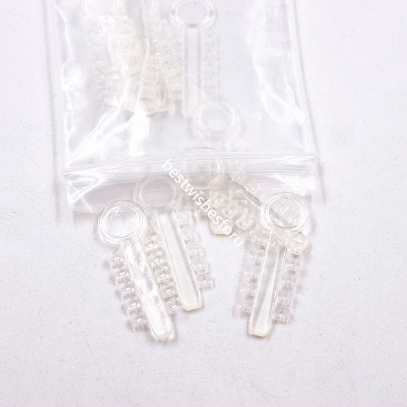 100 Pcs Dental Orthodontics Transparent Elastic Rubber Rotation Wedges 1 Pack