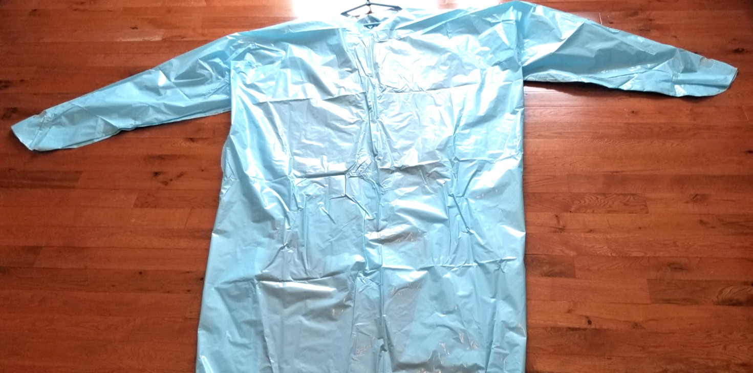 Set of 32 Disposable Blue Plastic Gowns Thumb Hook, over Head, Open Back. L/XL