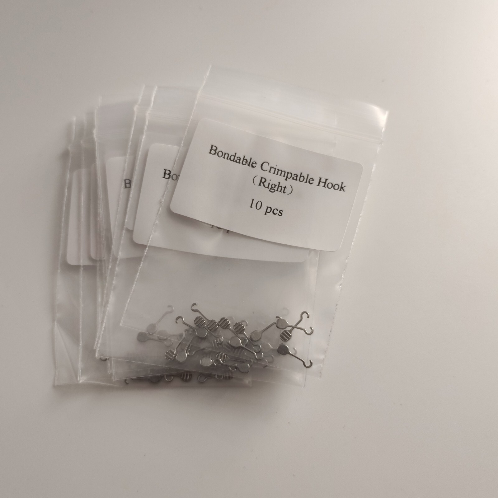 10Packs 100Pcs Bondable Sliding Crimpable Hook Long Curved Left Right 10Pcs/pack
